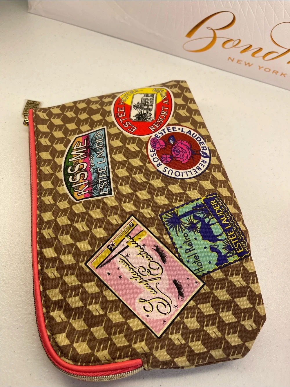 Estee Lauder Brown Patterned Cosmetic Pouch with Travel Patch Accents set of 3!